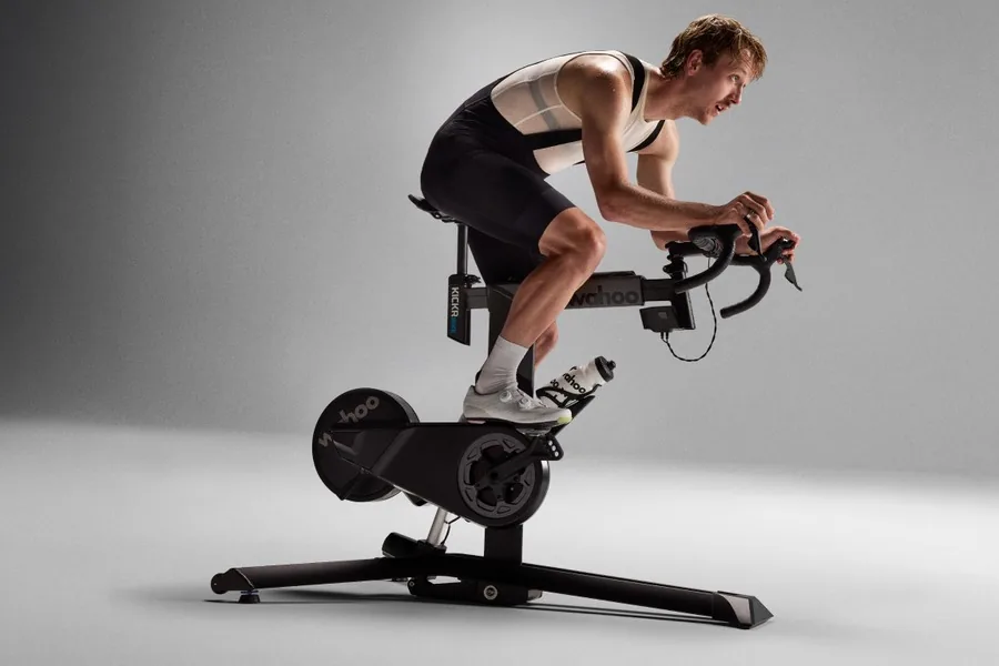 Side view of the KICKR BIKE PRO indoor smart bike in a training setup
