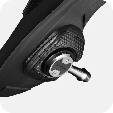 Side view showing the flush, aerodynamic integration between the cleat and the pedal body